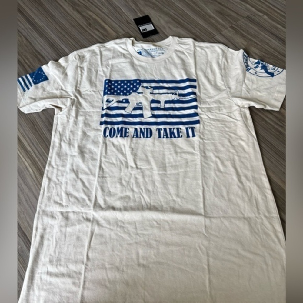 White T-Shirt with Blue Graphic Print